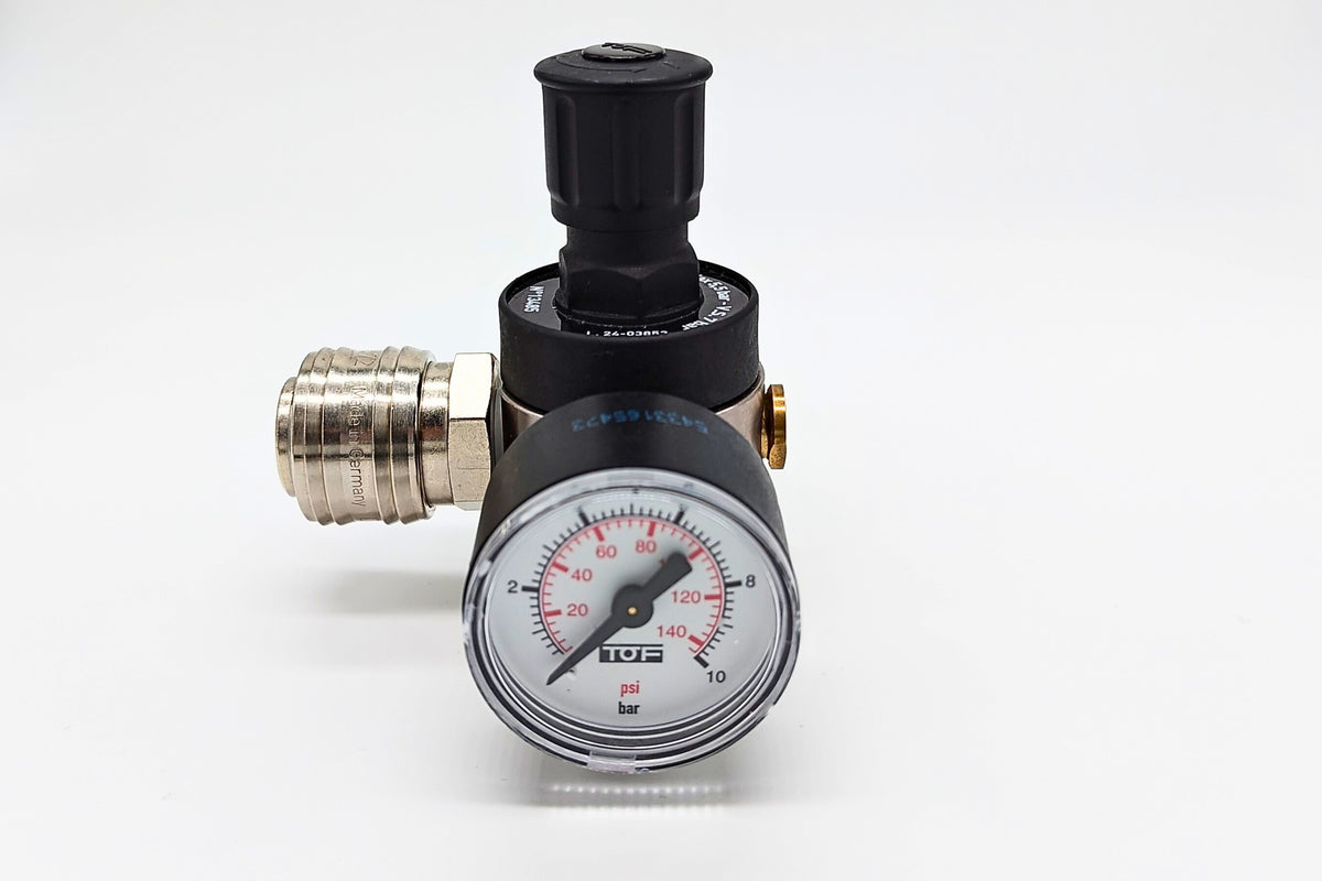 Pressure regulator with gauge on a white background