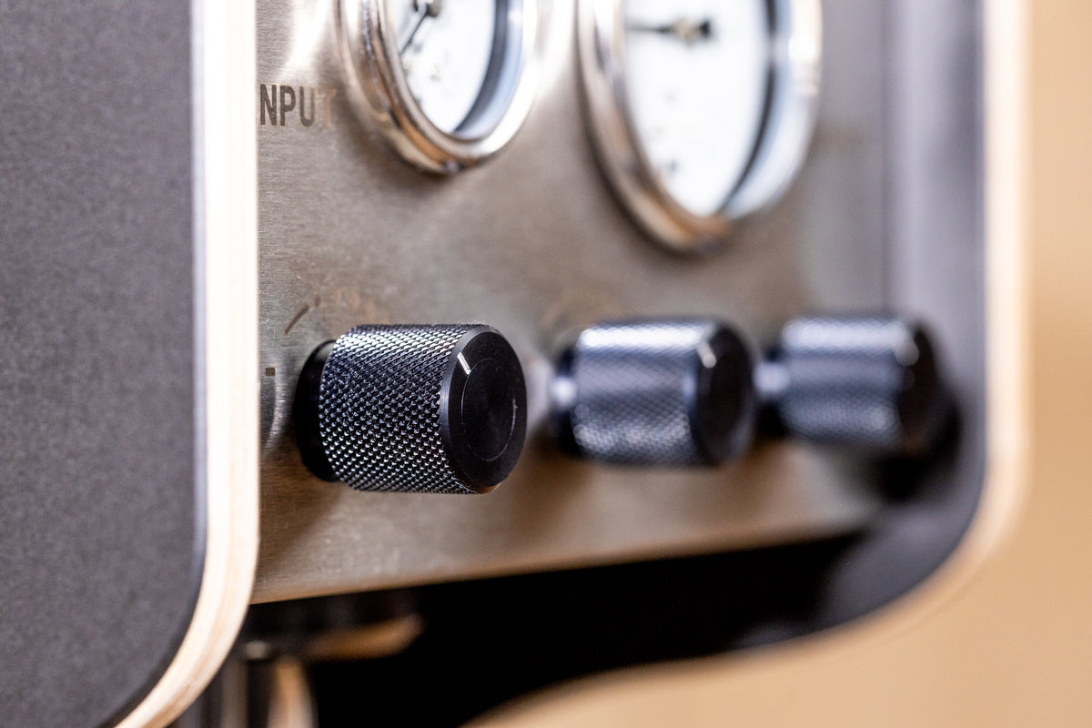 Close-up of the knurled aluminum control knob on the FLI VENTURI vacuum pump.